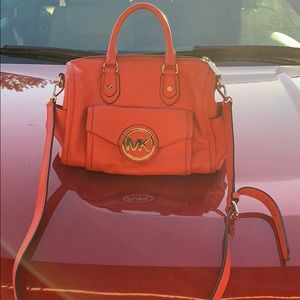 A red Michael Kors